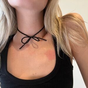 Beaded black bow choker